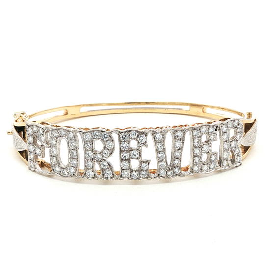 Bracciale in oro bicolore con scritta FOREVER e diamanti