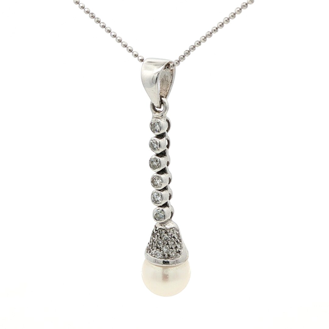 laterale Collana oro bianco perla e diamanti