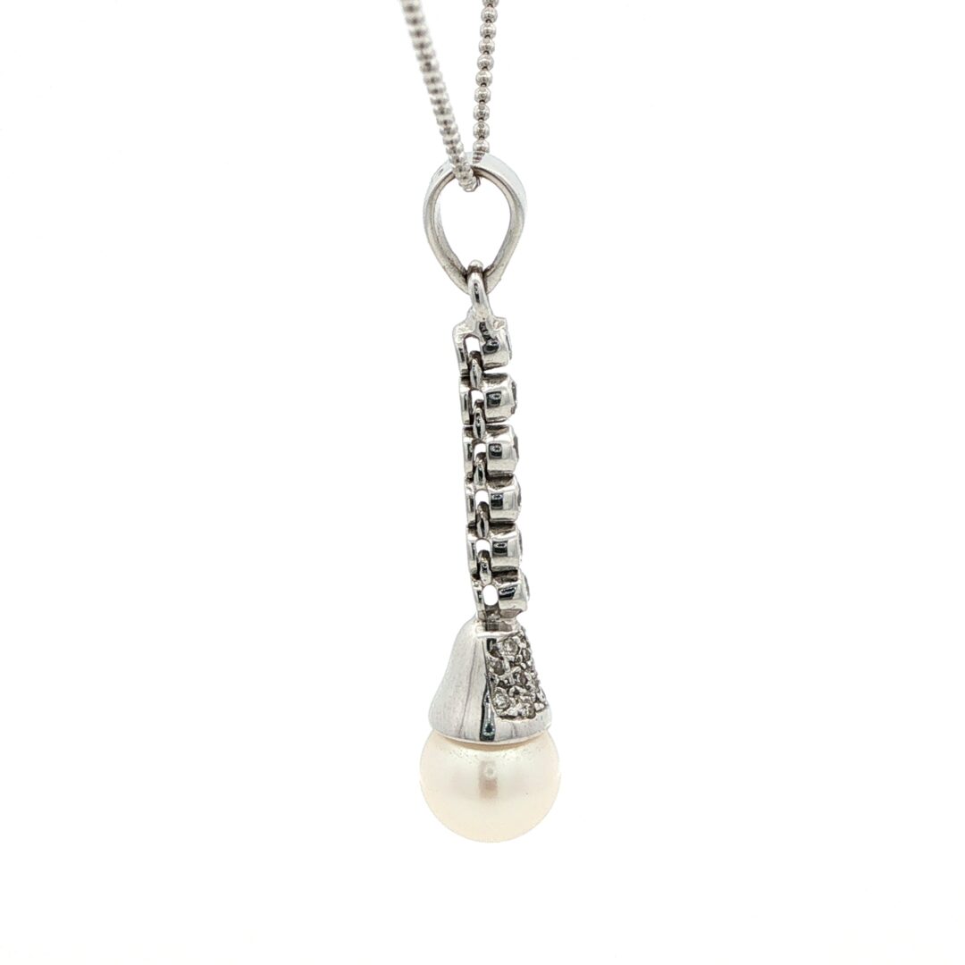 lato Collana oro bianco perla e diamanti